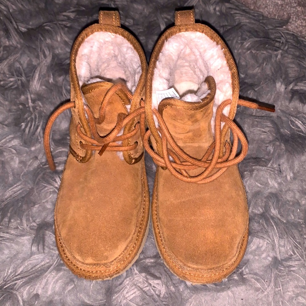 Ugg Children’s boot. Stylish & will keep their little feet warm for winter.